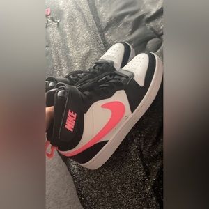 Black, White & Pink Nike Hightops.